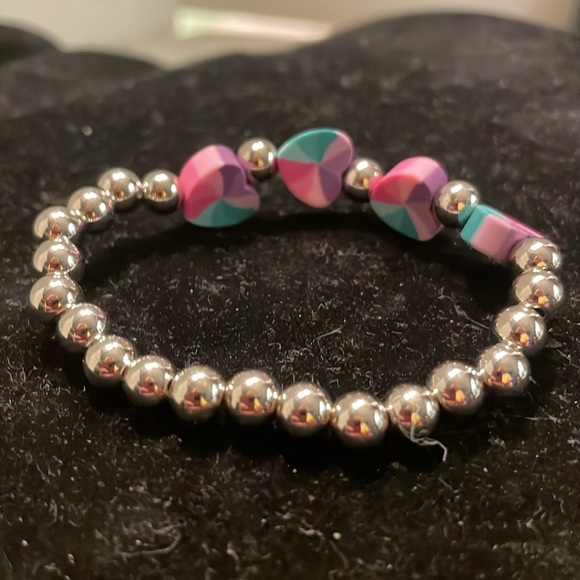 7” beaded stackable stretch bracelet with 23 silver beads & 4 heart shaped beads - Picture 8 of 13